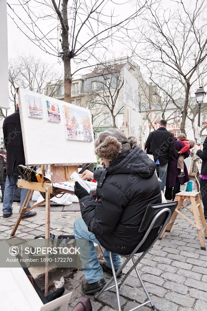 Painter at the art market at Place du Tertre, Montmartre, Paris, Ile de France, France, Europe