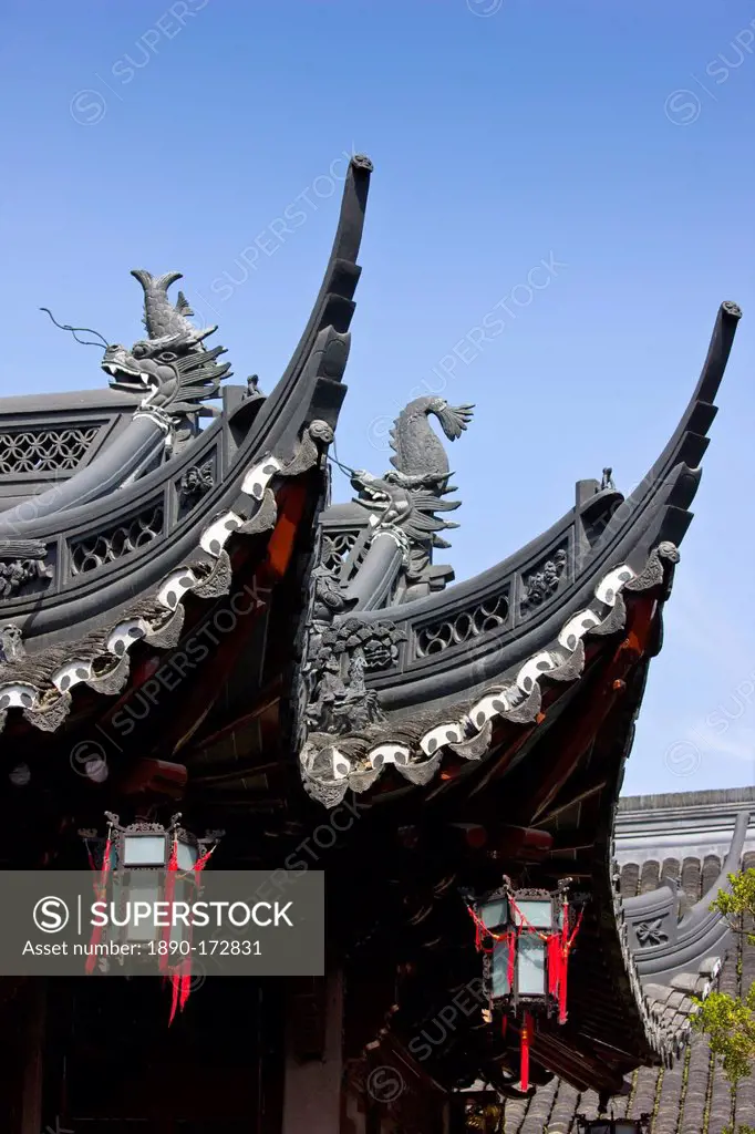 Chinese lanterns hanging from the Happiness Tower roofs, in the Yu Gardens, Shanghai, China