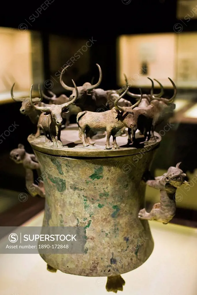 Bronze Han Dynasty cowrie container with yaks and lion decorations, on display in the Shanghai Museum, China