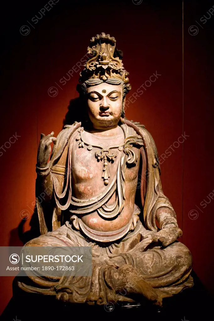 Stone Buddha figure of Bodhisattva on display in the Shanghai Museum, China