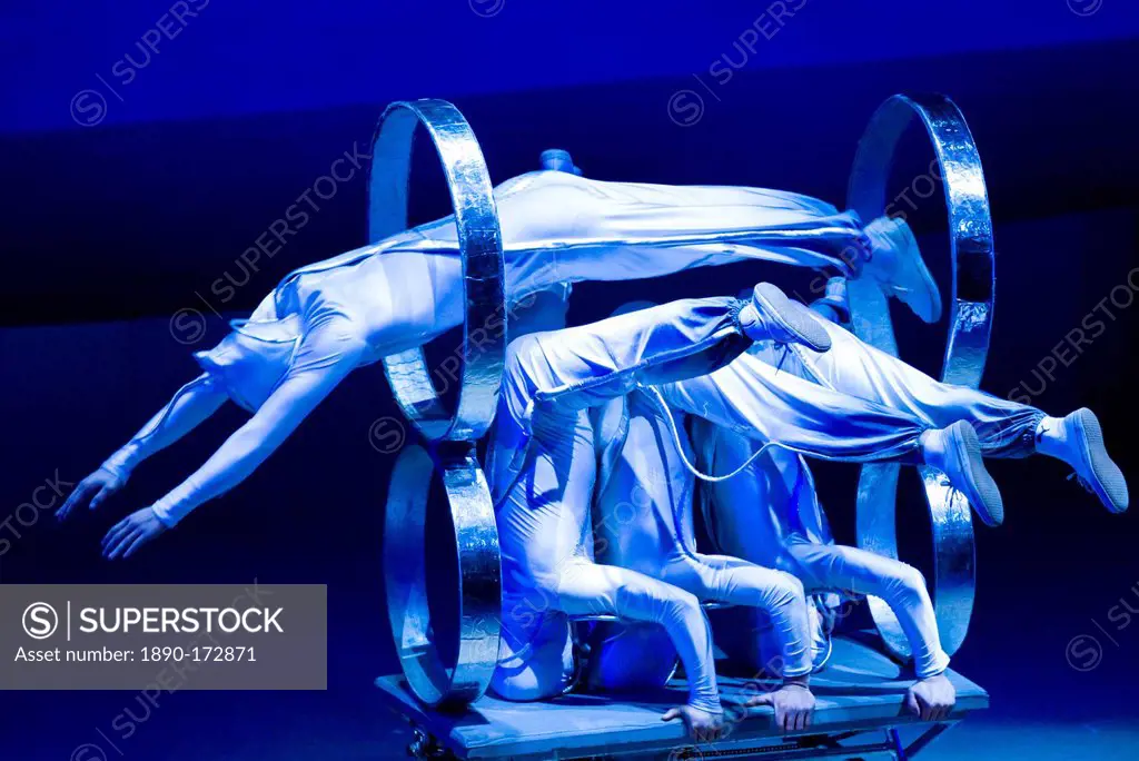 Members of the Shanghai Acrobatic Group performing on stage at the Shanghai Centre Theatre, China