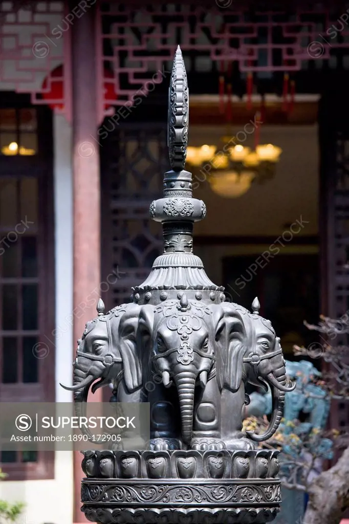 Bronze elephant-heads statue in the courtyard of the Jade Buddha Temple, Shanghai, China