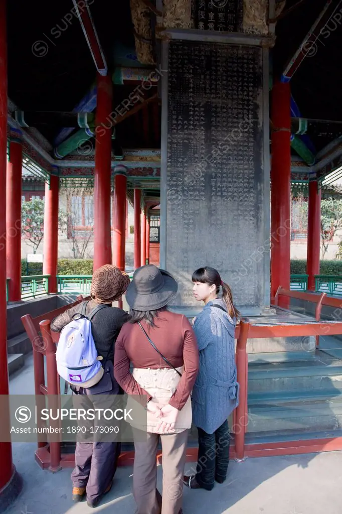 Visitors look at the Forest of Stone Tablets, also known as the Forest of Stelae, Xian, China