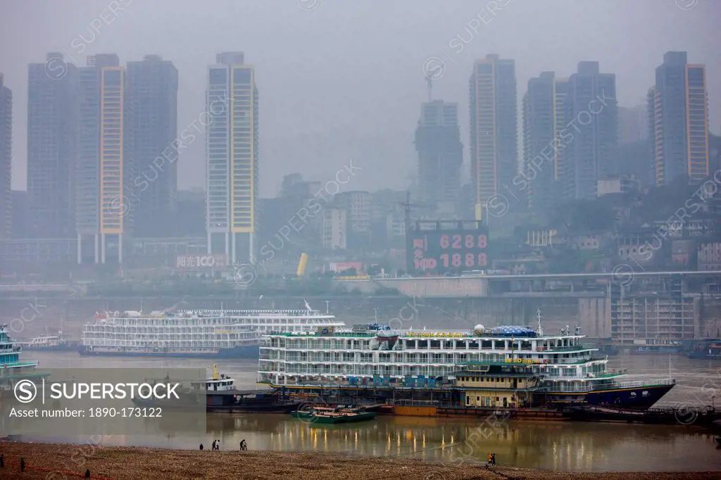 Pleasure cruisers from Victoria Line awaiting Western passengers for Yangtze River cruise, Chongqing, China