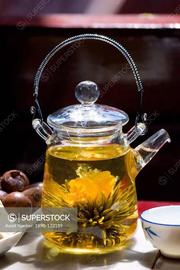 Flower infused tea and traditional snacks in the Huxinting Teahouse, Yu Garden Bazaar Market, Shanghai, China