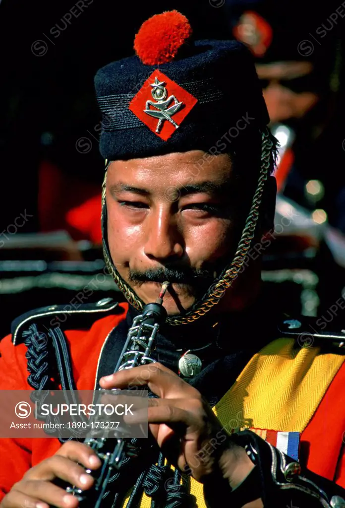 Man plays clarinet in Nepalese Army Band, Nepal