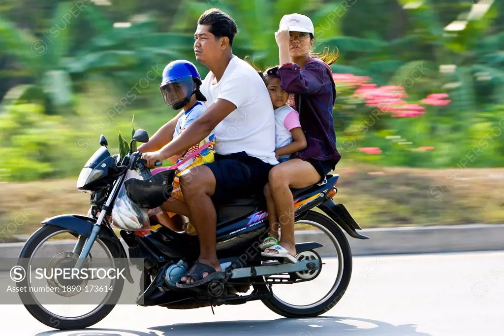 Family travel on a motorcyle, Bangkok, Thailand