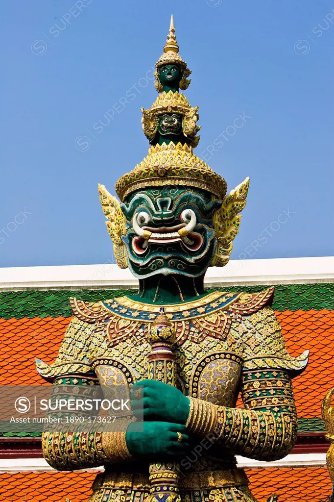 Demon Giant statue guards an entrance to The Grand Palace, Bangkok, Thailand