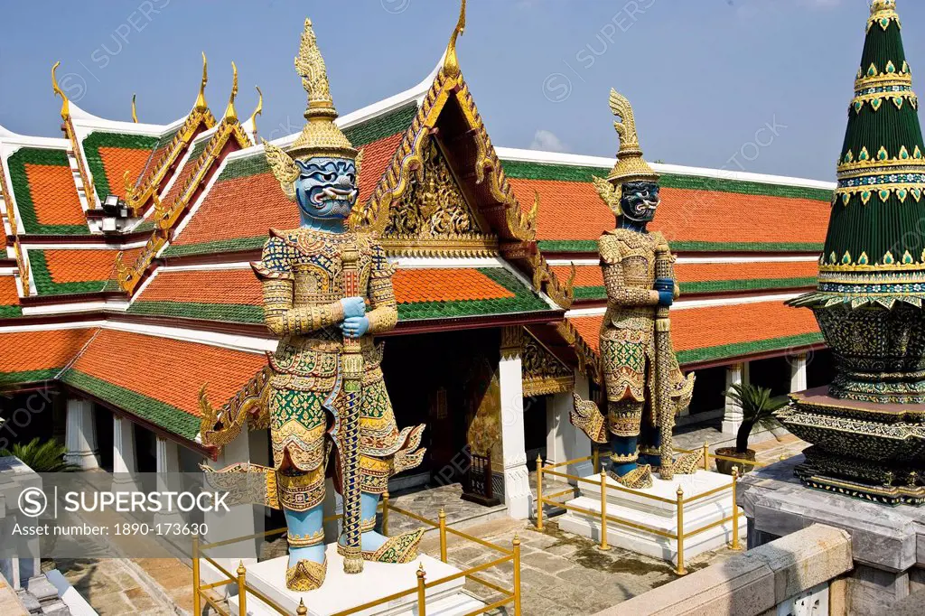 Demon Giant statues guard an entrance to The Grand Palace and Temple Complex, Bangkok, Thailand