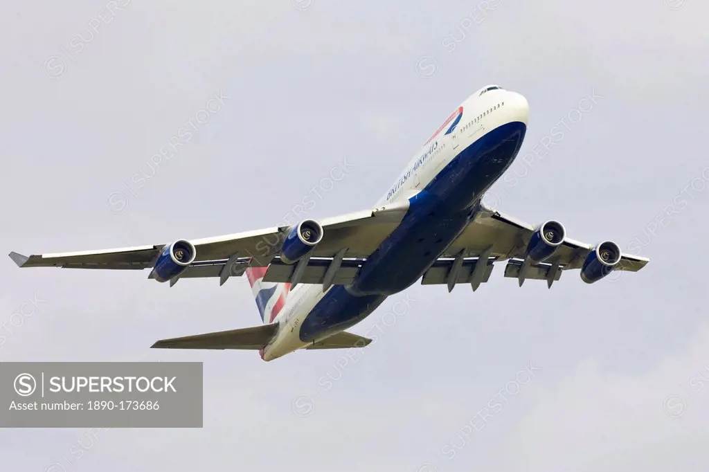 British Airways Jumbo Jet flying away from Heathrow, London, United Kingdom