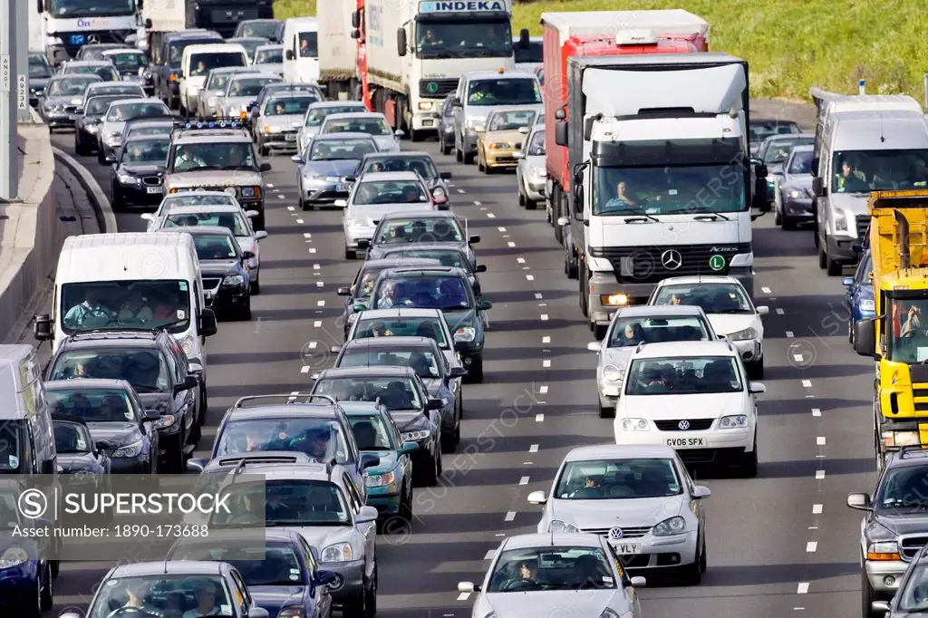 Traffic congestion cars and trucks on M25 motorway, London, United Kingdom