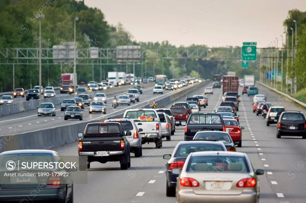Heavy weight of traffic travelling on freeway lanes, outskirts of Washington DC, USA