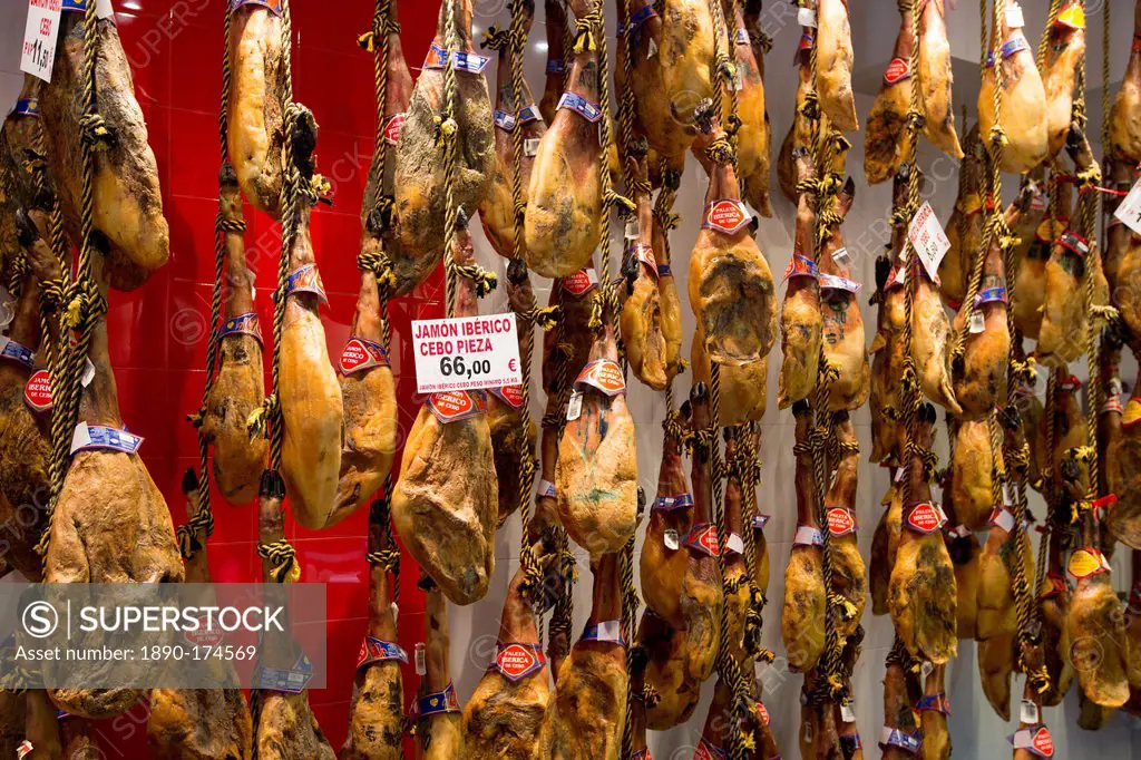 Iberico Ham and other meats on sale in food shop in Calle de Bidebarrieta in Bilbao, Spain