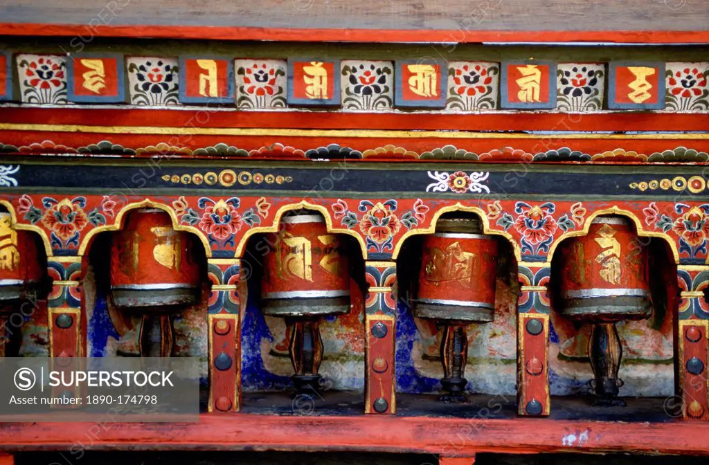 Colourful prayer wheels at the Kyichu Buddhist Temple in Paro, Bhutan.