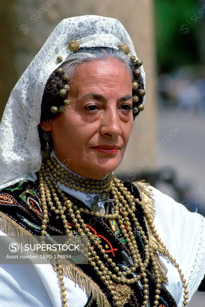Dancer in national dress wearing lace mantilla and gold beads in Salamanca, Spain