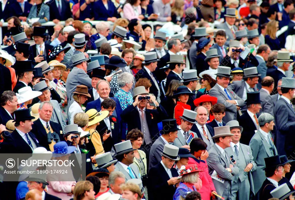 Crowd of racegoers on Derby Day at Epsom Races in Surrey, England