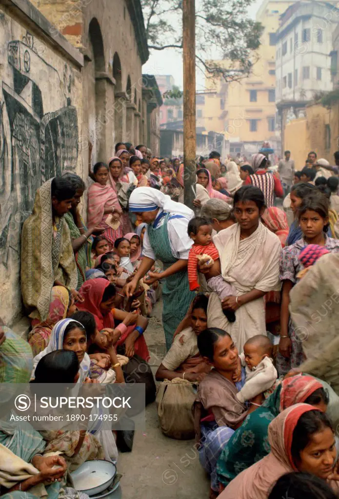 Poor women queuing for food at Mother Teresa's Mission in Calcutta, India