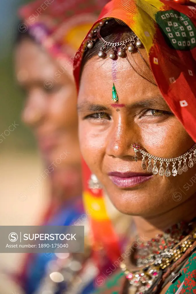 Portrait of a young woman in traditional dress, Jaisalmer, Rajasthan, India, Asia