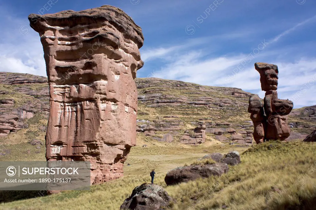 Rock formations in the Tinajani Canyon in the Andes, photographer in foreground, Peru, South America
