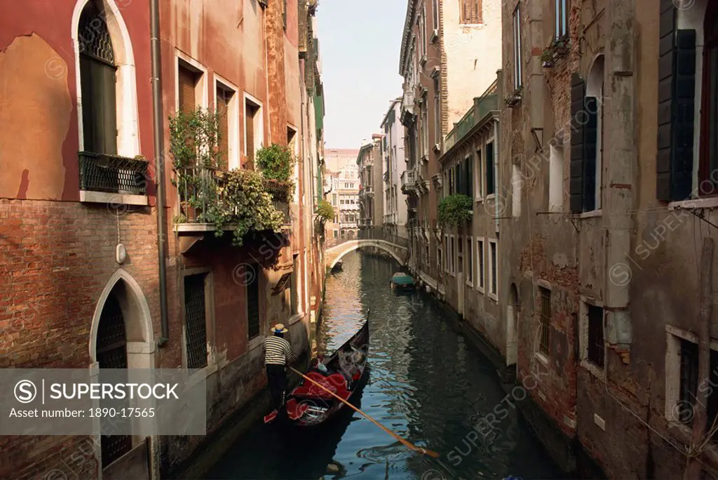 Gondolas on a canal near Piazza San Maria Formosa. Venice, Veneto, Italy, Europe