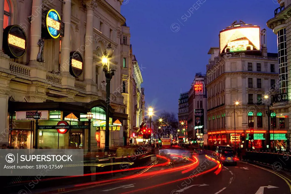 Traffic trails and theatre signs at night near Piccadilly Circus, London, England, United Kingdom, Europe