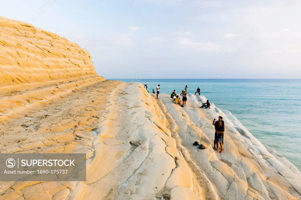 Scala dei Turchi, tourists relaxing at sunset, Rossello Cape, Realmonte, Agrigento, Sicily, Italy, Mediterranean, Europe