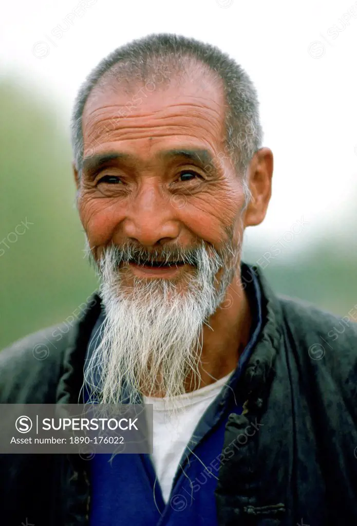 An old man with grey beard in Xian, China