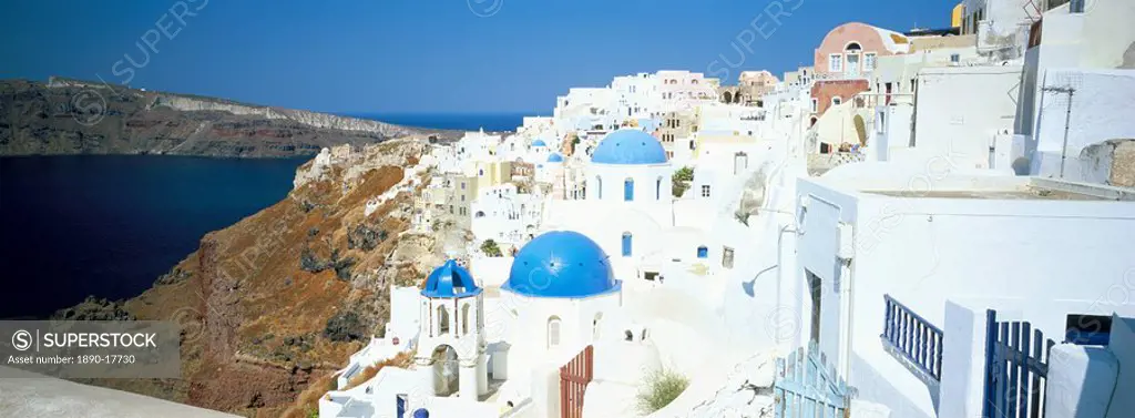 View of Oia with blue domed churches and whitewashed buildings, Santorini Thira, Cyclades Islands, Greek Islands, Greece, Europe