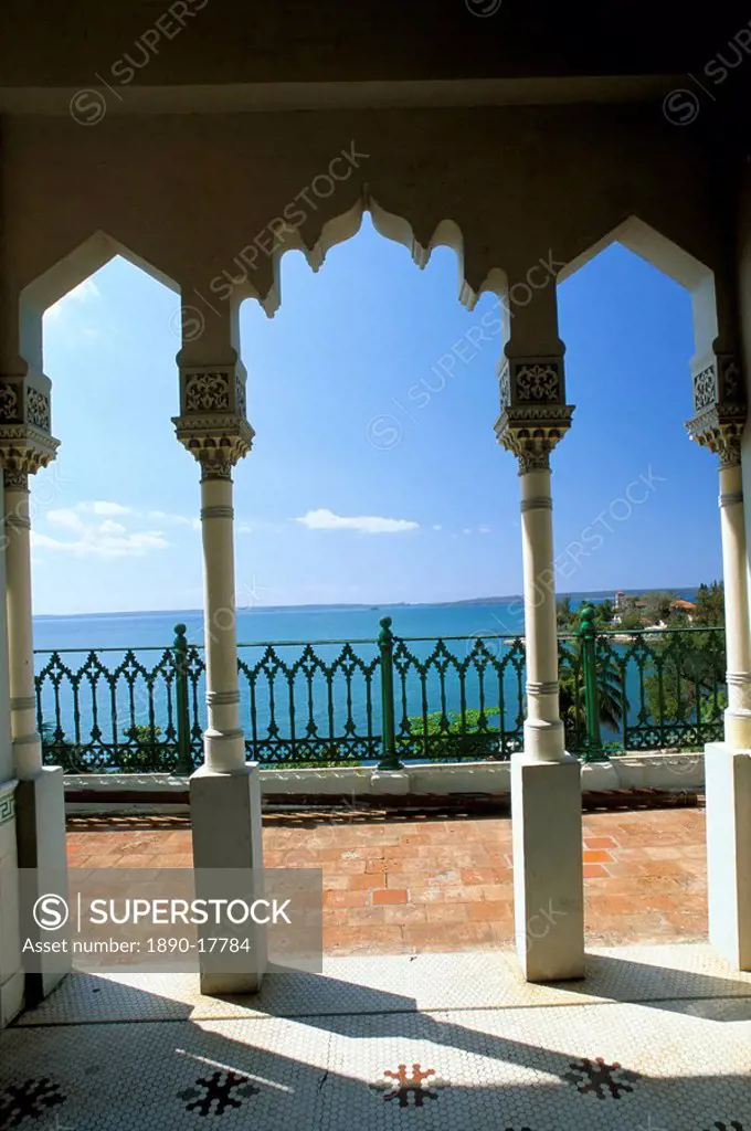 View to sea through Moorish arches at Palacio de Valle, Cienfuegos, Cuba, West Indies, Central America