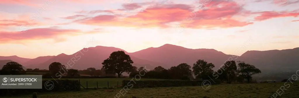 Sunset over Lakeland fells from Castlerigg stone circle, near Keswick, Lake District, Cumbria, England, United Kingdom, Europe