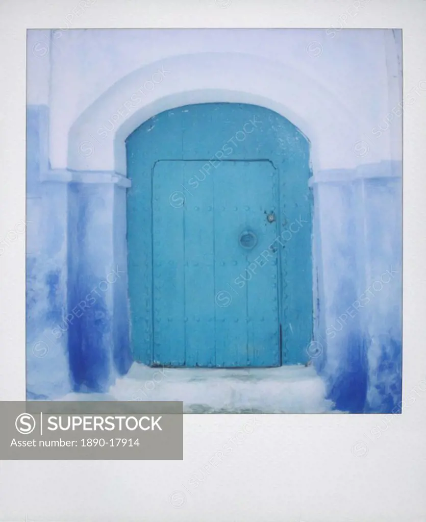 Polaroid of painted blue door against blue and whitewashed wall, Chefchaouen, Morocco, North Africa, Africa