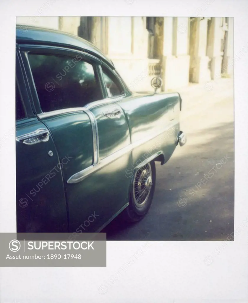 Polaroid of light reflecting in paintwork of classic American car, Havana, Cuba, West Indies, Central America