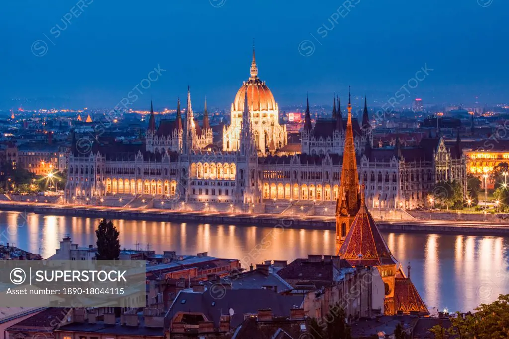 The Hungarian Parliament Building and River Danube at night, UNESCO World Heritage Site, Budapest, Hungary, Europe