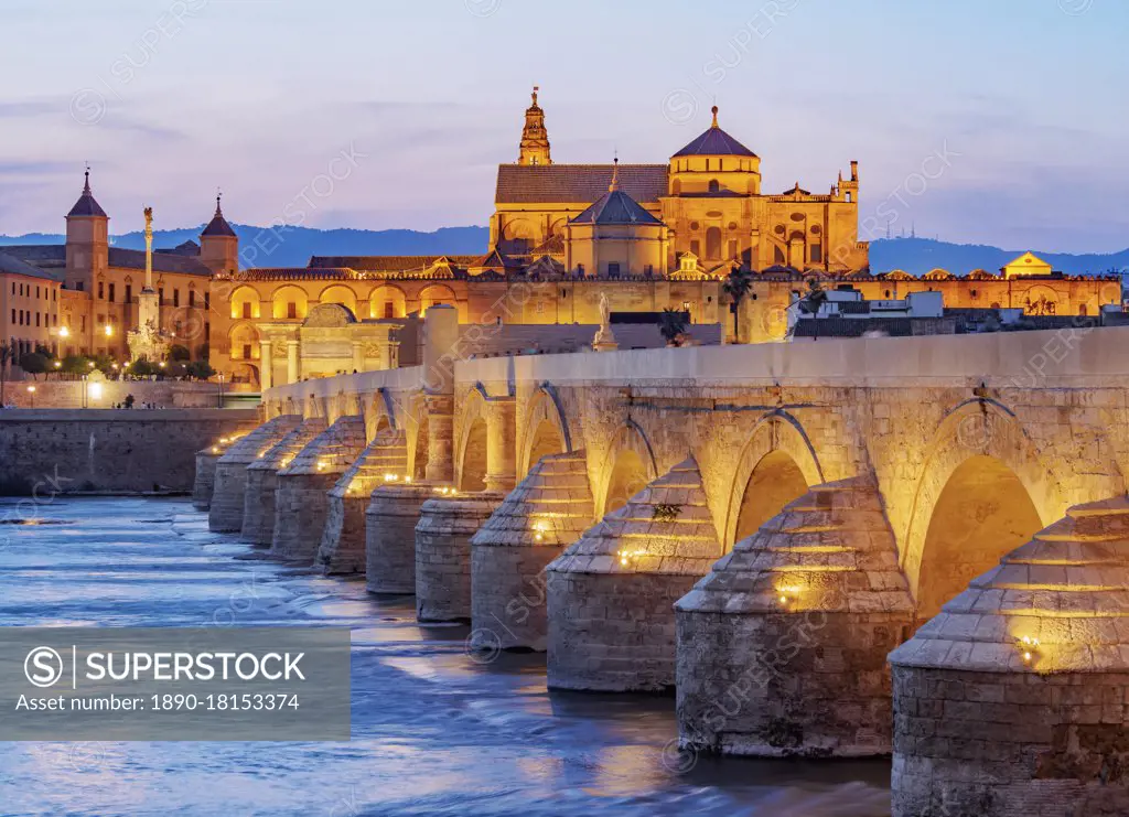 View over Roman Bridge of Cordoba and Guadalquivir River towards the Mosque Cathedral, dusk, UNESCO World Heritage Site, Cordoba, Andalusia, Spain, Europe
