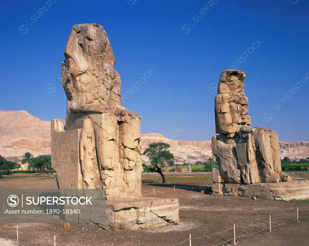 Statues of Amenhotep or Amenophis III known as the Colossi of Memnon at Thebes, UNESCO World Heritage Site, Egypt, North Africa, Africa