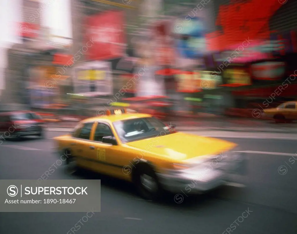 Yellow cab on the street in Times Square in New York, United States of America, North America