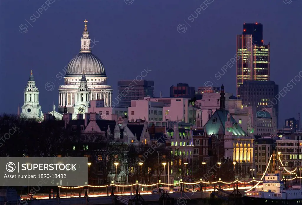 City skyline, including St.Paul´s Cathedral and the NatWest Tower, from across the Thames at dusk, London, England, United Kingdom, Europe
