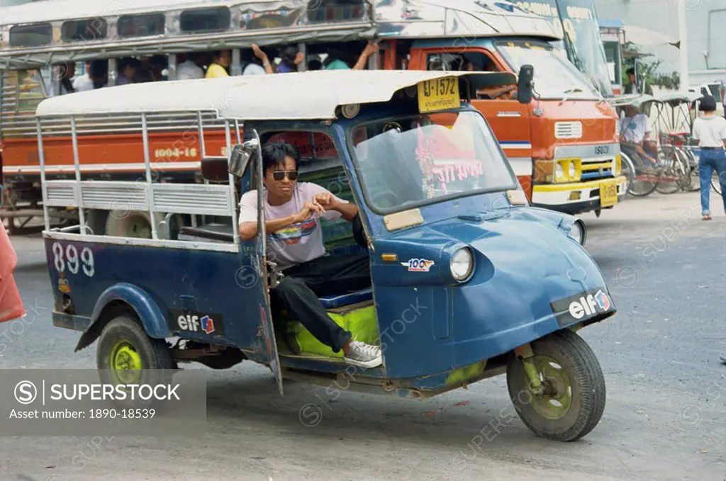 Driver of local transport vehicle on the road in Ayutthaya, Thailand, Southeast Asia, Asia