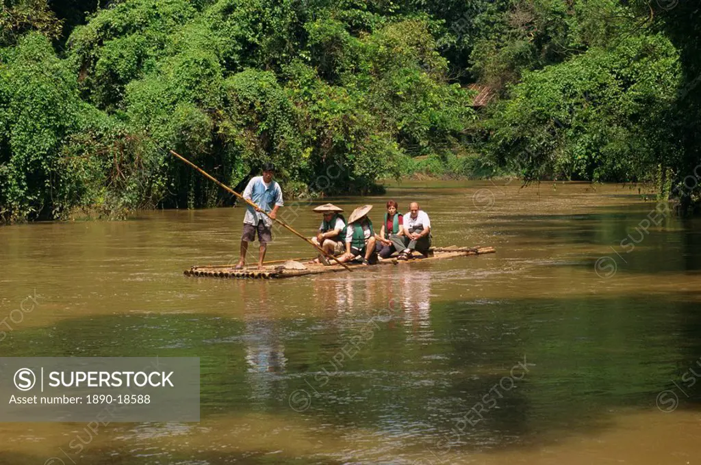 Tourists rafting on the Ping river at the Chiang Dao elephant training centre, in Chiang Mai, Thailand, Southeast Asia, Asia