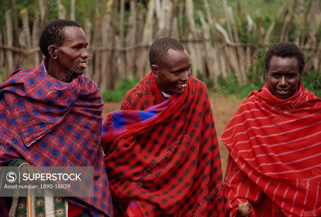 Masai men chanting and watching dance, Ngorongoro Conservation Area, Tanzania, East Africa, Africa