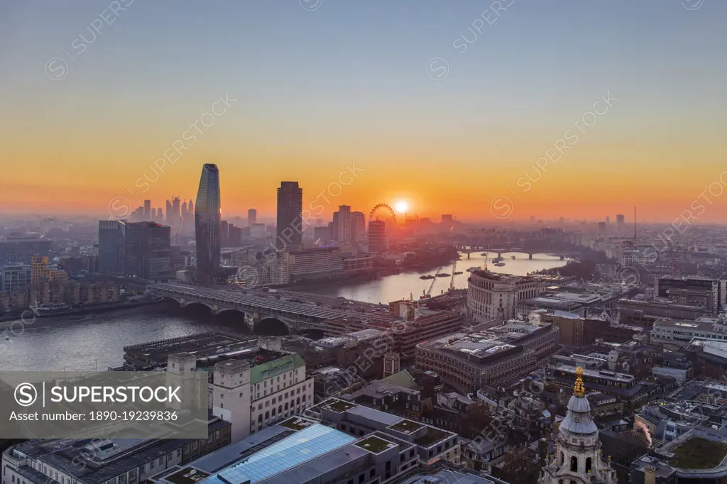 Aerial view of London skyline and River Thames at sunset taken from St. Paul's Cathedral, London, England, United Kingdom, Europe