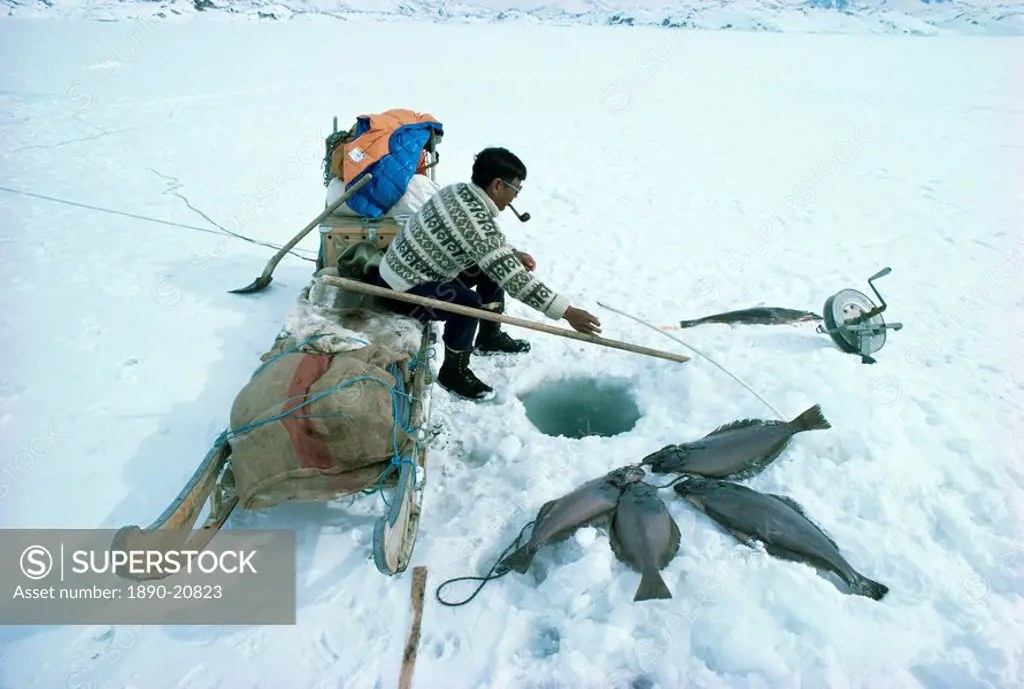 Inuit man fishing for halibut, eastern area, Greenland, Polar Regions