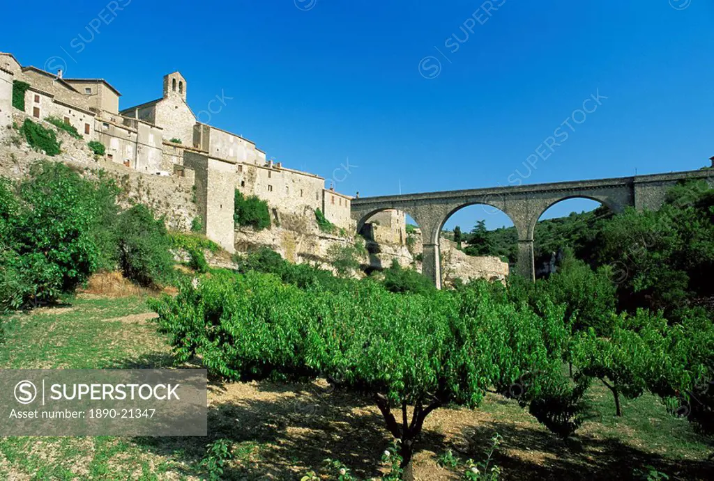 Village seen from floor of the Cesse River canyon, Minerve, Herault, Languedoc_Roussillon, France, Europe