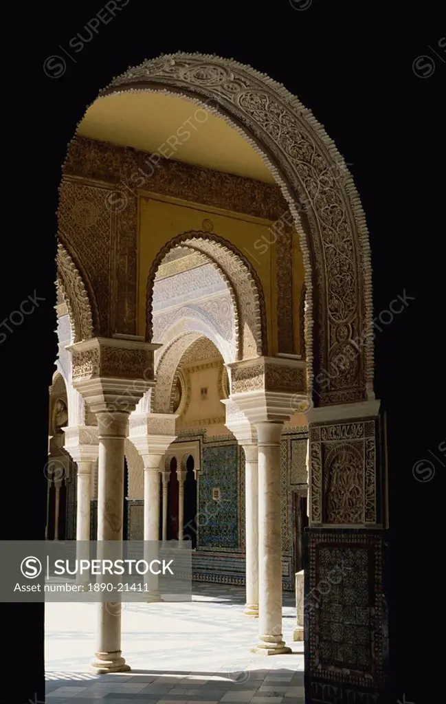 View through archway to the Patio Principal, Casa de Pilatos, Seville, Andalucia Andalusia, Spain, Europe