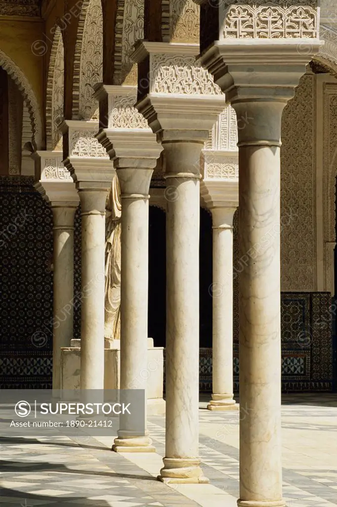 Slender pillars of the Patio Principal showing Mudejar carving, Casa de Pilatos, Seville, Andalucia Andalusia, Spain, Europe