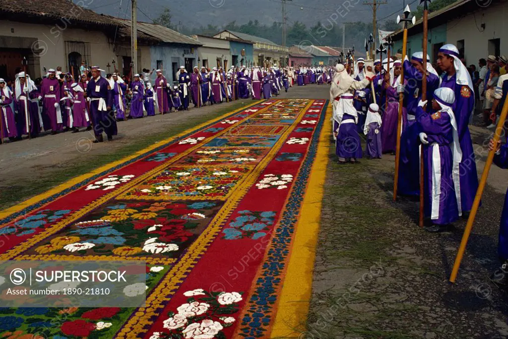 Penitents and street rug, La Merced, Good Friday of Easter Week, Antigua, Guatemala, Central America