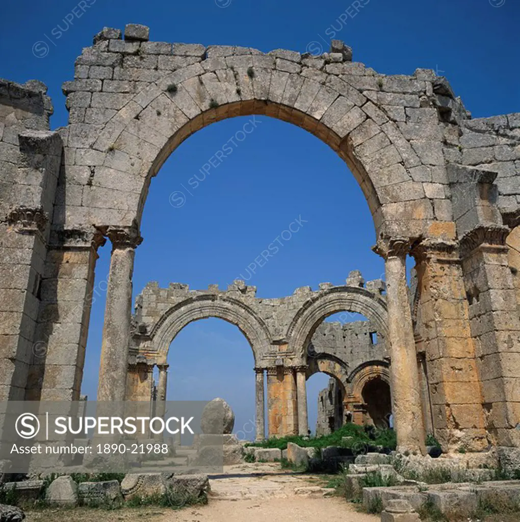 Remaining arches of the Cruciform Church, dating from between 476 and 491 AD, with the base of the pillar of St. Simeon the Stylite, Dead City region,...
