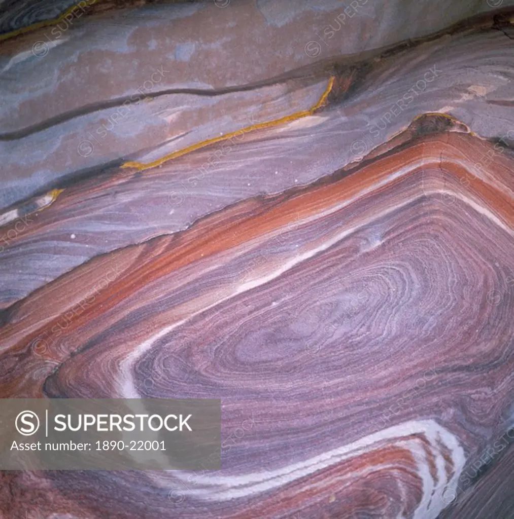 Close_up of coloured sandstone from which the Nabateans carved their city, Petra, Jordan, Middle East