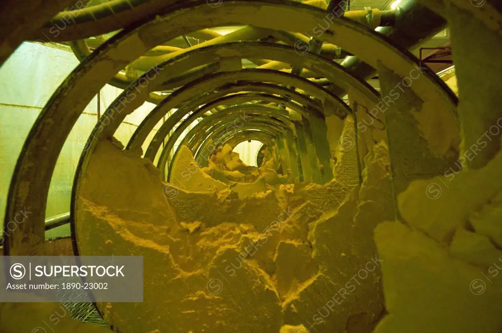 Yellow cake, powdery uranium oxide in Burwell filter press, Uranium City, Saskatchewan, Canada, North America