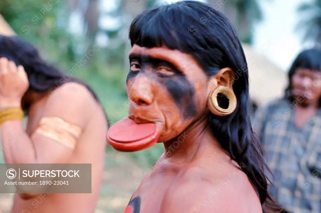 Portrait of a Suya Indian man with lip plate, Brazil, South America 1971